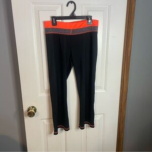 Woman’s Black and Orange Leggings